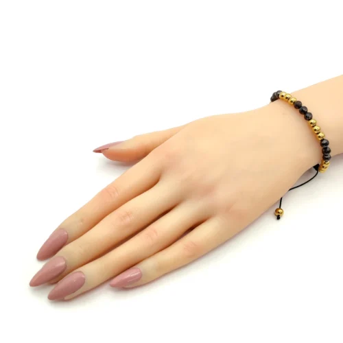 Pulsera-Acero-Dorado-Balines-Cuentas-Negras-Recorrible-1.webp