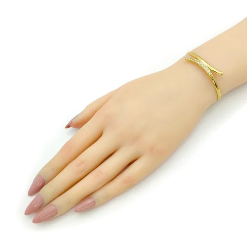 Pulsera-Acero-Dorado-Brazalete-Lineas-Curvo-Cristales-3.webp