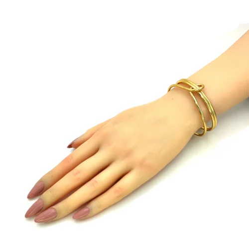 Pulsera-Acero-Dorado-Brazalete-Nudo-Elegante-Ajustable-3.webp
