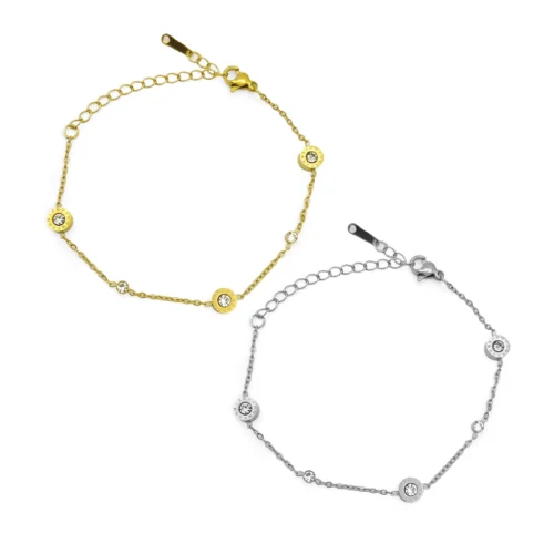 Pulsera de acero inoxidable con círculos, números romanos y cristales claros sobre fondo blanco