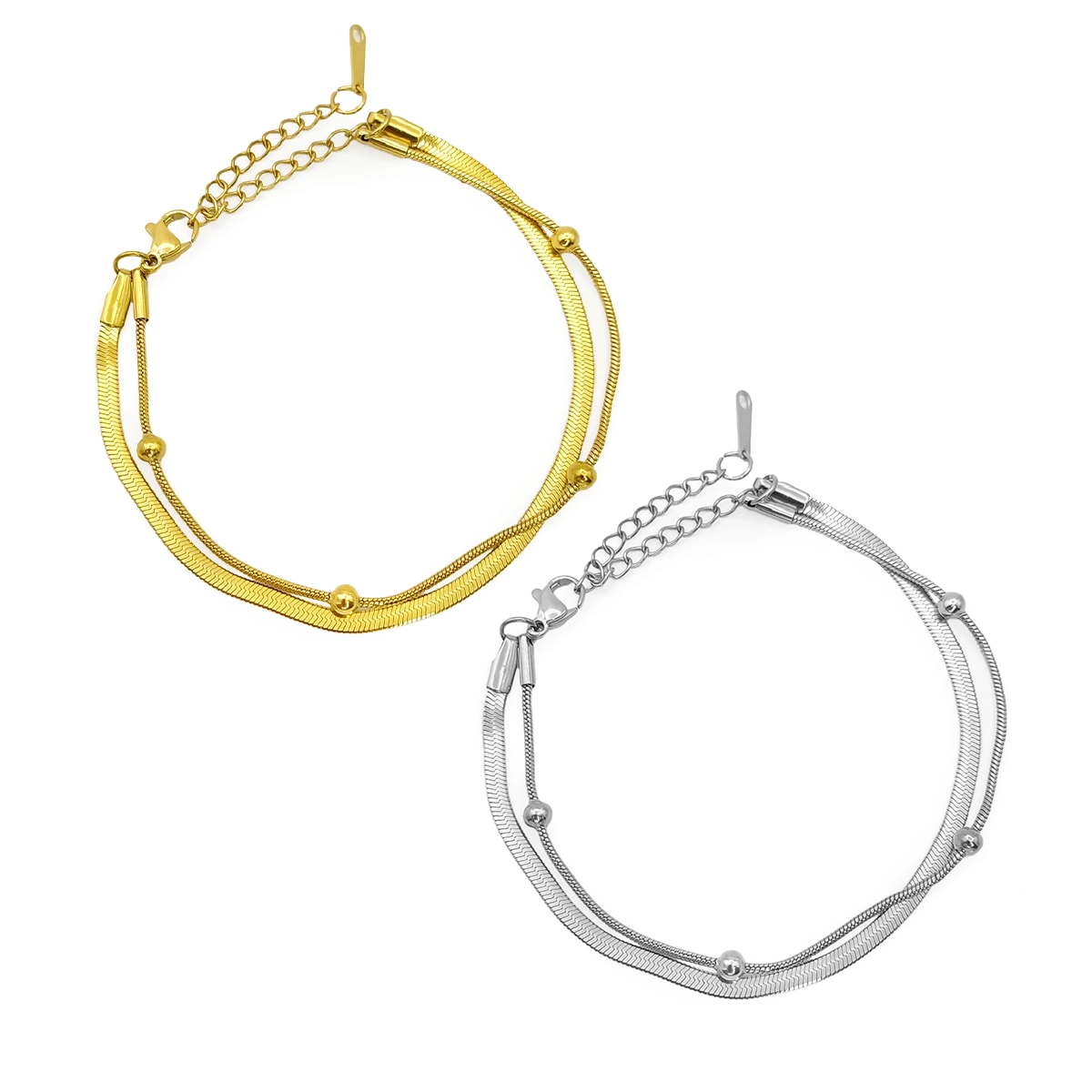 Pulsera doble de acero inoxidable con balines en acabado dorado y plateado, con cadena planchada y cadena cola de rata sobre fondo blanco